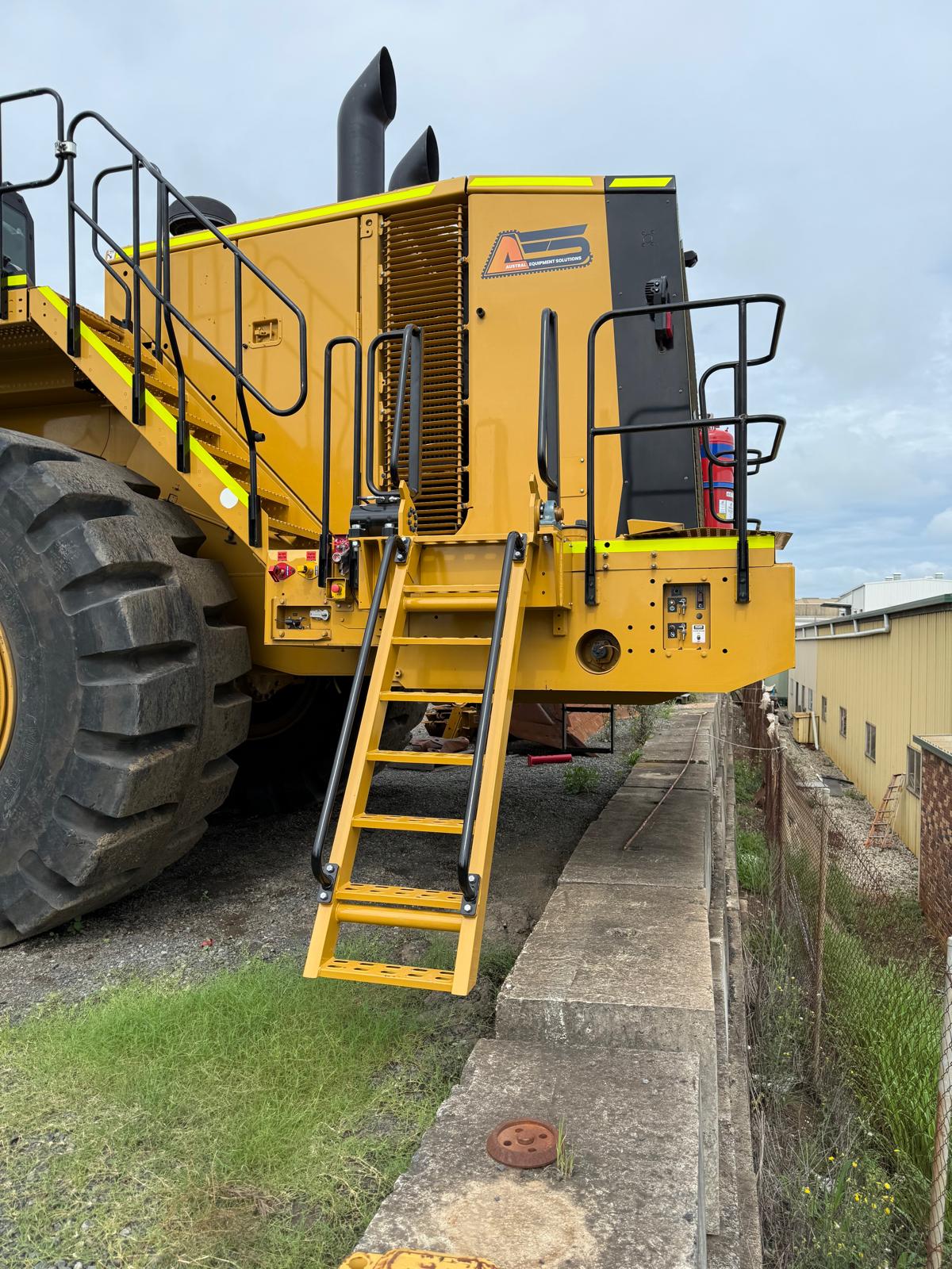 Loader safety handrails and platforms
